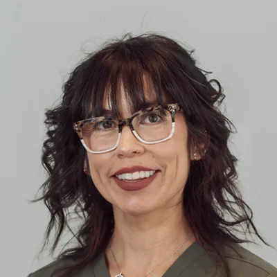 A headshot photo of Missy